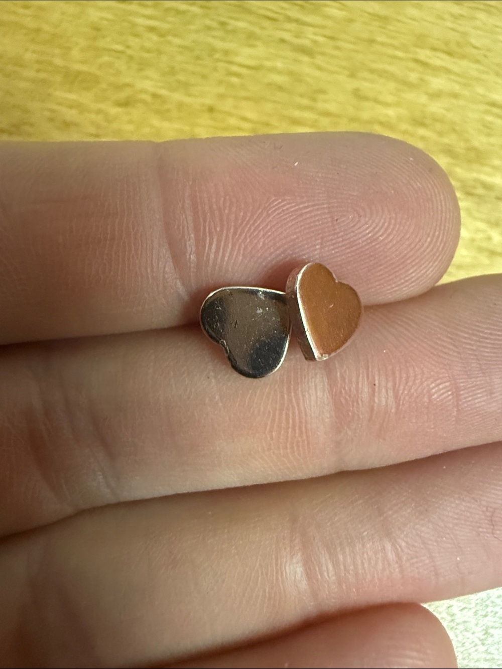 Rose gold tone heart studs